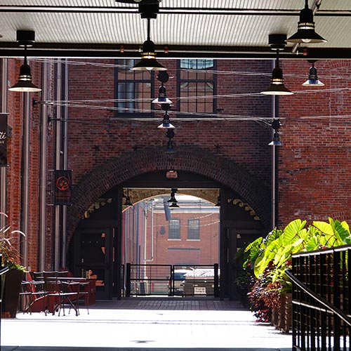 alleyway in Dubuque that's connecting two red brick buildings