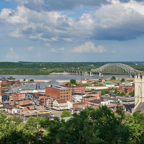 city of Dubuque showing buildings and bridge going across Mississippi River