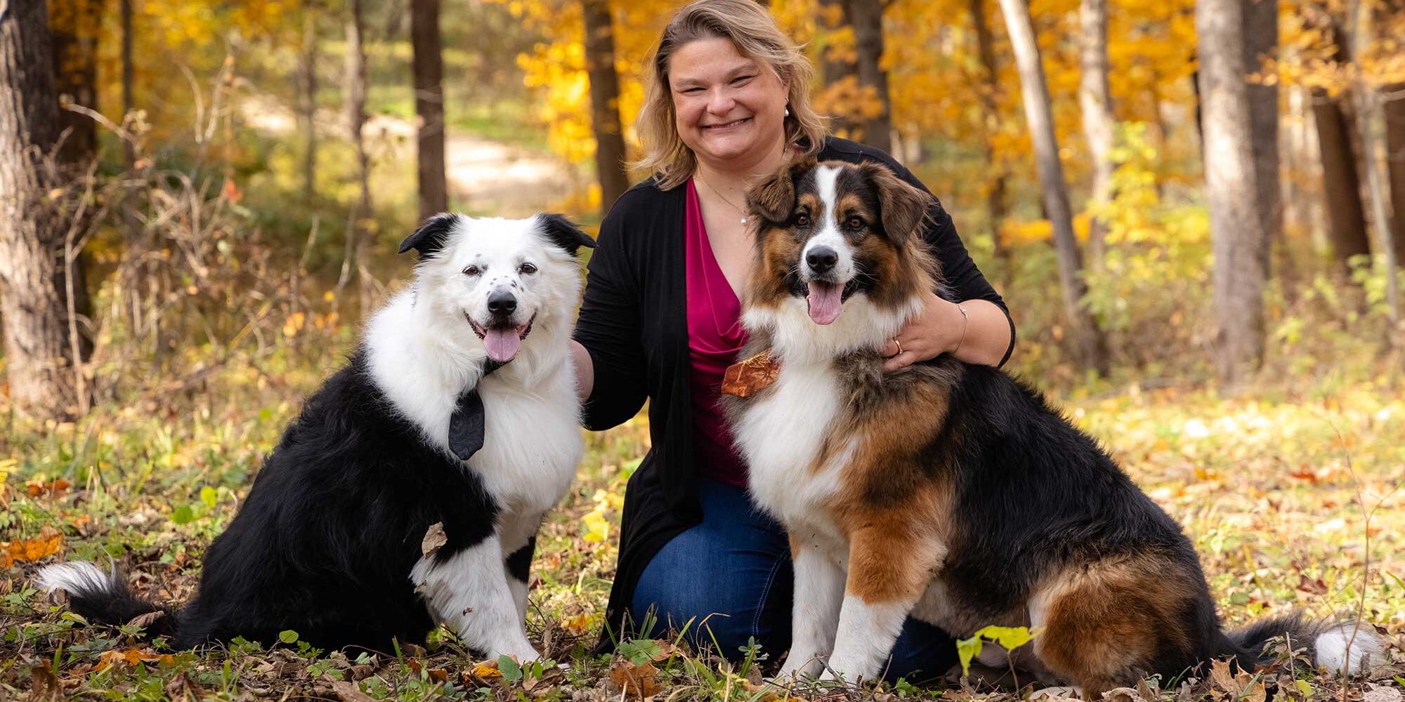 Doctor Hellert With Her Two Fluffy Dogs Doctor Hellert With Her Two Fluffy Dogs